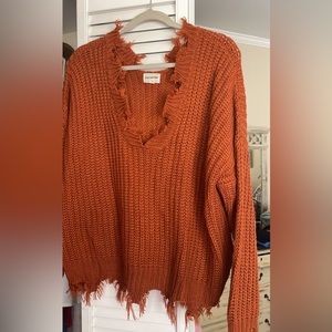 Beautiful soft and distressed sweater